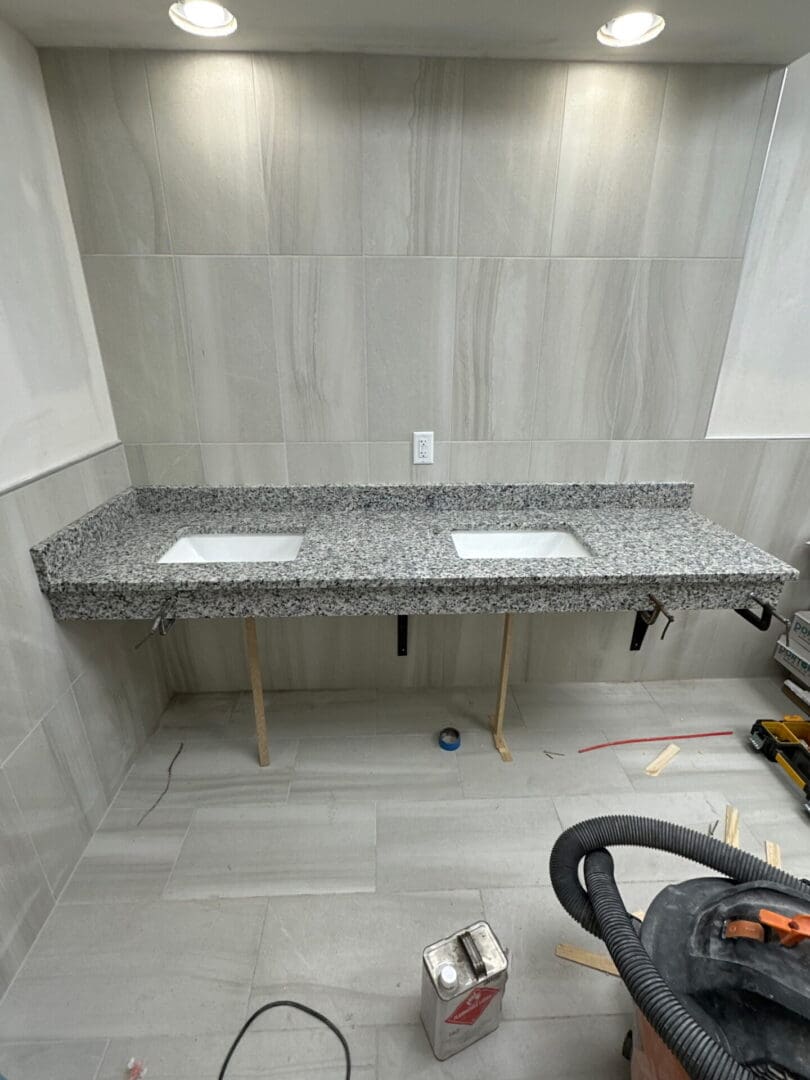 Granite double sink bathroom countertop installation